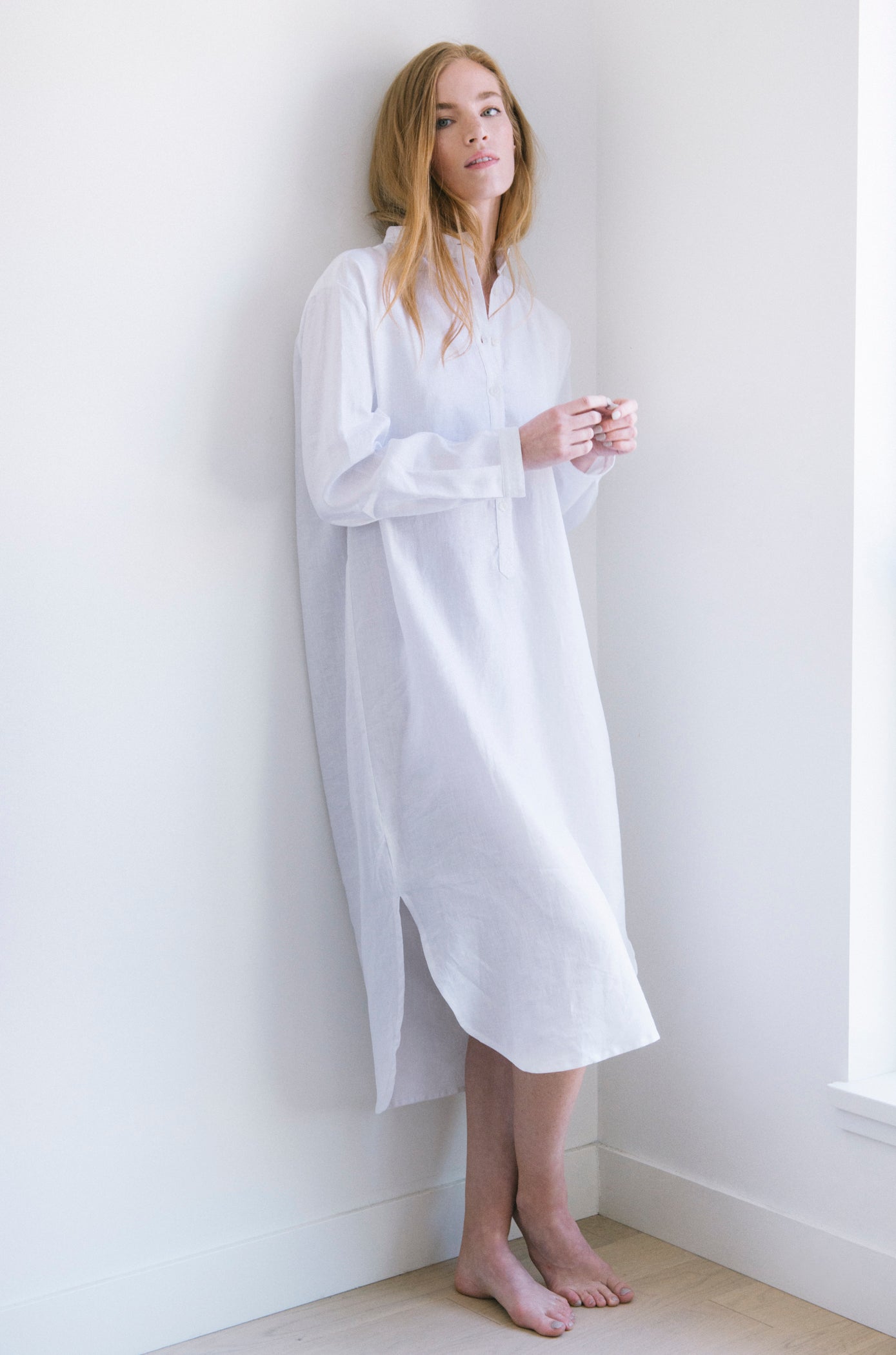 editorial shot of ankle length sleep shirt in white linen by The Sleep Shirt