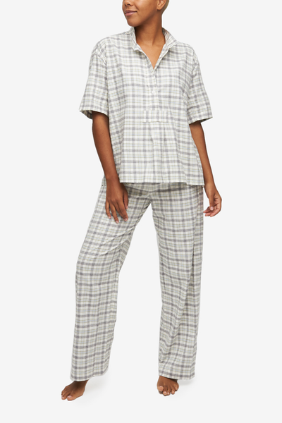 Short sleeve shirt and lounge pant pajama set by The Sleep Shirt in a cream-based with grey and green plaid cotton flannel.