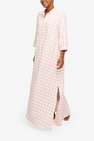 The Full Length Sleep Shirt in a cream and pink check flannel. Floor length, with side slits for ease of movement. 