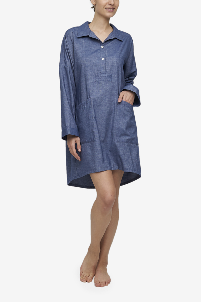 Blue cotton flannel night shirt with a traditional mounted shirt collar and three quarter placket. Modest sleepwear with two patch pockets.
