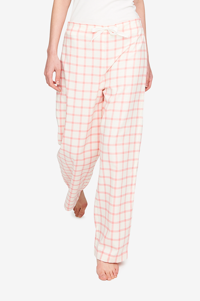Front view of the Lounge Pant in a beautiful cream and pink check flannel. Th best thing to sleep in on cold nights. 