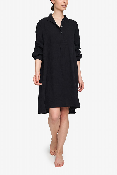 A long black nightshirt, made in a perfect fabric - a double gauze cotton. Long sleeves, button down three quarter placket with matching buttons. Sleeves can be worn long or cuffed to elbow.