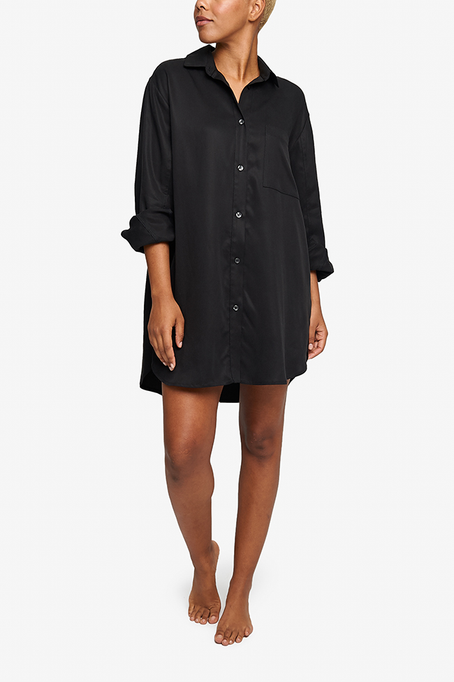 Oversized boyfriend-style button down dress shirt. Long sleeves, shirt collar and cuffs. Made in a  luxe tencel fabric in classic black.