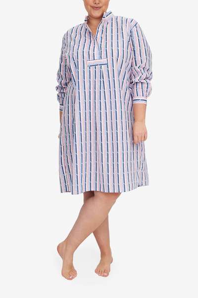 Showing the Plus sized version of our best selling Long Sleep Shirt, the  pink and blue trio stripe is bright and fun. 