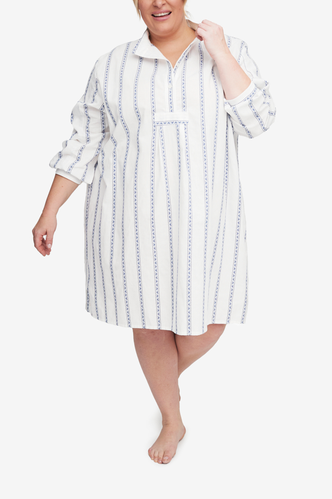 High collar, long sleeve classic nightshirt, above the knee length. In a vertical blue stripe on a white background, 100% cotton. above the knee.Long length Sleep Shirt, made in Canada. A unique blue and white vertical stripe, in 100% cotton. High-quality cotton sleepwear. Plus and X Plus extended size best-selling classic short sleep shirt.