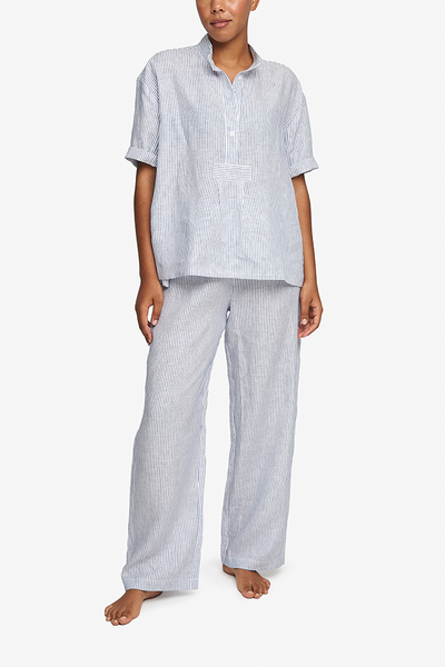 online sleepwear shopping ends here - a short sleeve pj top and matching drawstring pants in a white and blue stripe linen.