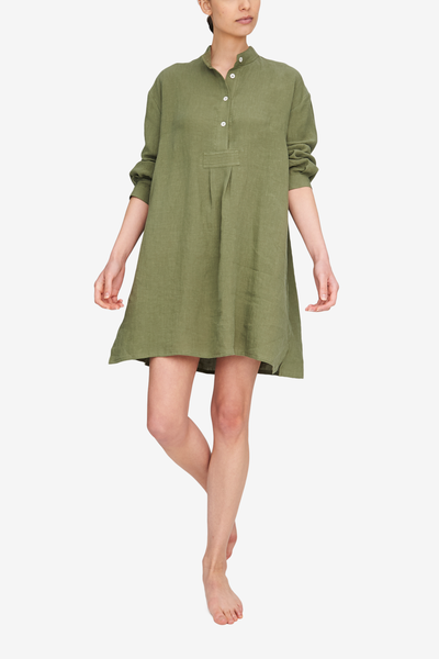 Front view of the Short Sleep Shirt in a deep, sage green. Made from a washed linen so it's a soft, loose linen that hangs beautifully off the body. Length is a few inches above the knee on most bodies, but still offers bum coverage.