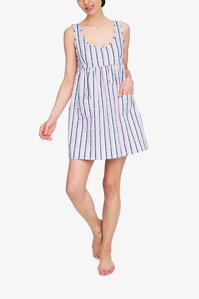 The Pocket nightie, shown here in the Blue & Pink Trio Stripe, has a high empire waist, a tank-style bodice and a gathered skirt with two patch pocket on the front. It's on the shorter side, hitting most about mid-thigh. 