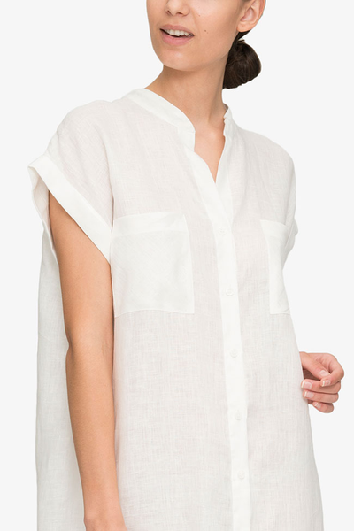 front cropped view knee length button down tshirt with pockets in white linen by the Sleep Shirt