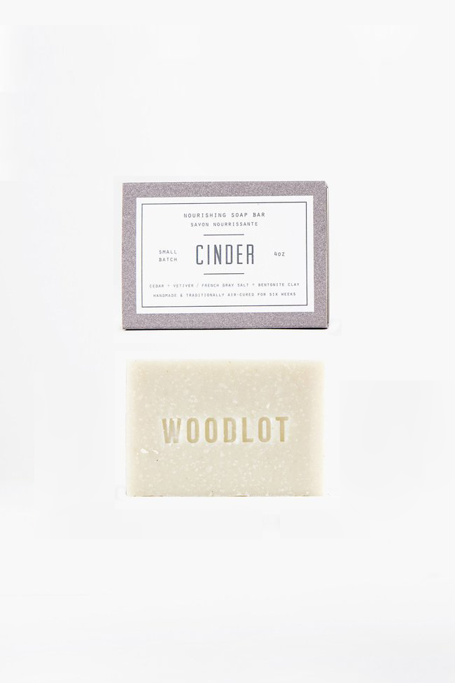 a bar of woodlot soap and its box, the cent is called cinder. Nourishing soap bar.